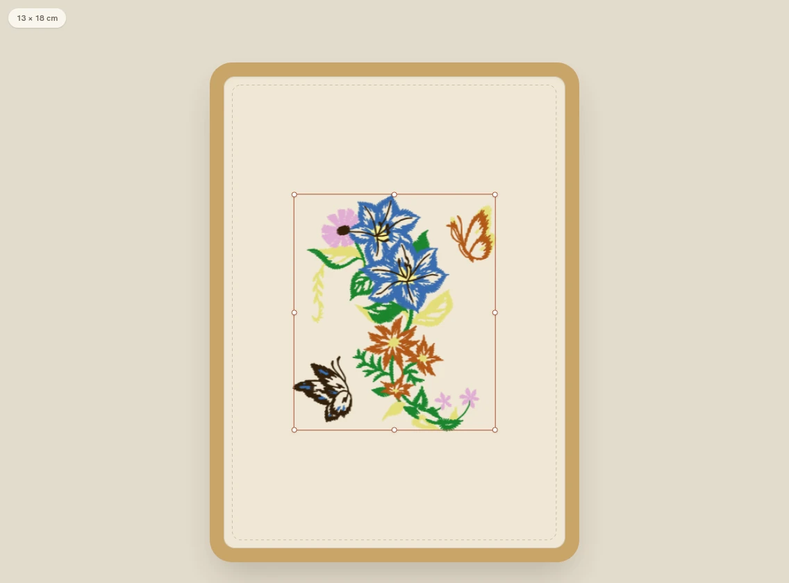 Bordimo workbench with a floral design selected inside a 13 by 18 centimeter hoop